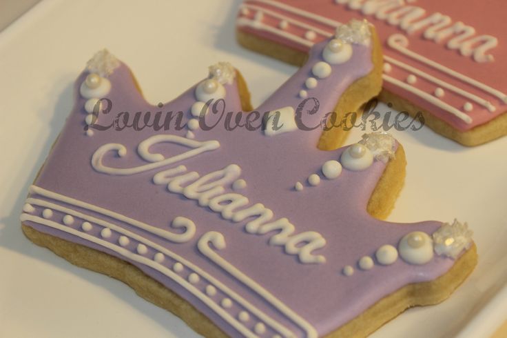 Regal Crown-Shaped Cookies with Purple Icing and Edible Pearls for Celebrations.