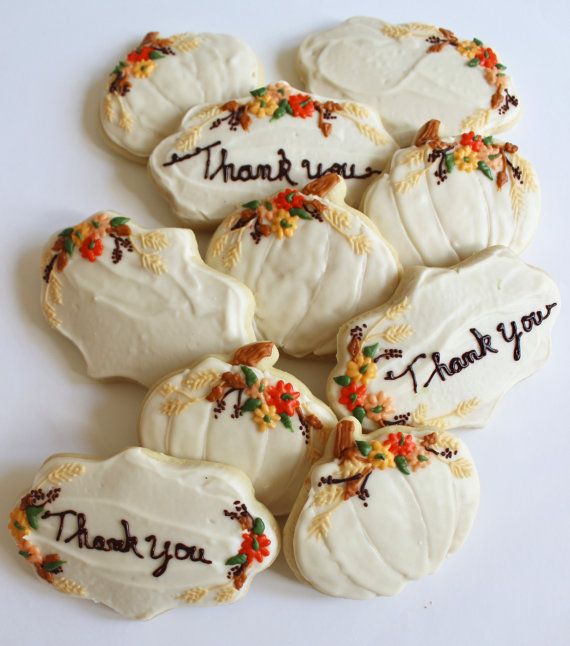 Festive Autumn-Inspired Decorative Cookies with Intricate Icing Designs.