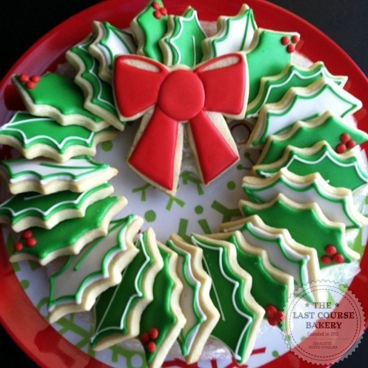 Festive Wreath-Shaped Holiday Cookies Decorated with Holly Leaf Designs.