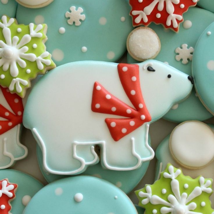 Cheerful Winter-Themed Polar Bear Cookies with Festive Designs.