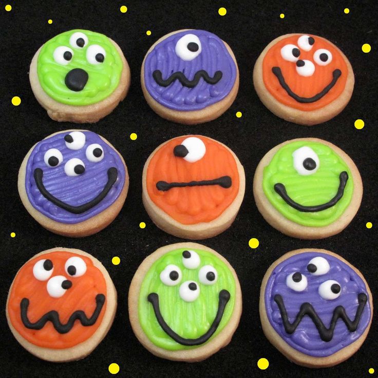 Playful Monster-Themed Cookies with Vibrant Frosting and Fun Designs.