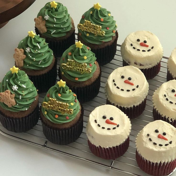 Festive Holiday Cupcakes: Christmas Tree Designs and Cheerful Snowman Faces.