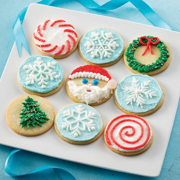 Charming Holiday Cookies Adorned with Festive Designs and Vibrant Icing