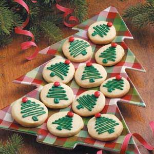 Cheerful Christmas Tree-Shaped Cookies with Colorful Icing and Candies.