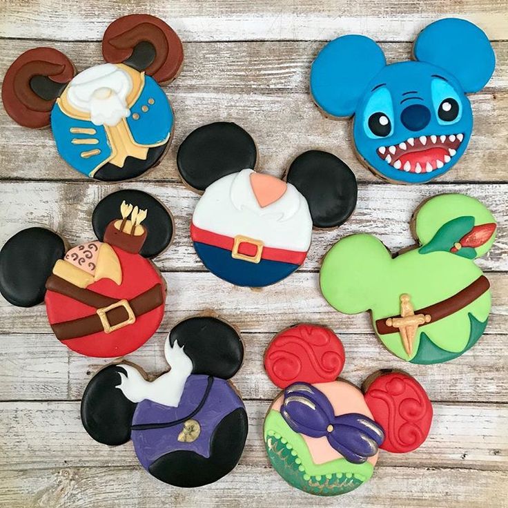 Mickey Mouse-Themed Colorful Cookies: A Playful Assortment for Celebrations.