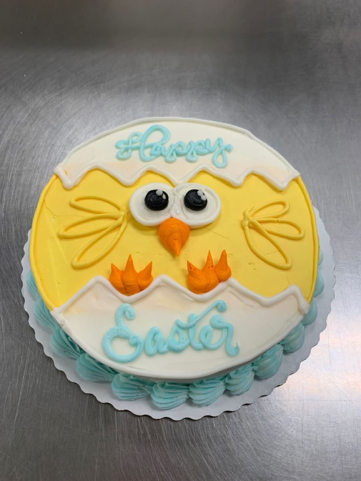 Festive Easter Cake with Whimsical Chick and Pastel Decorations