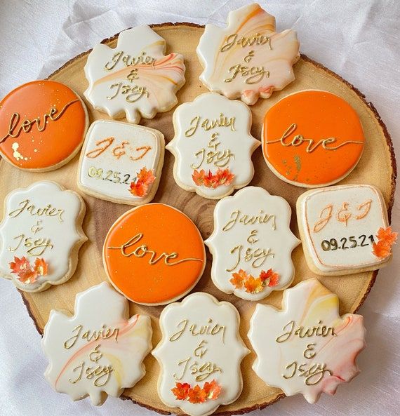 Charming Festive Display of Elegant Decorative Cookies on Wooden Platter