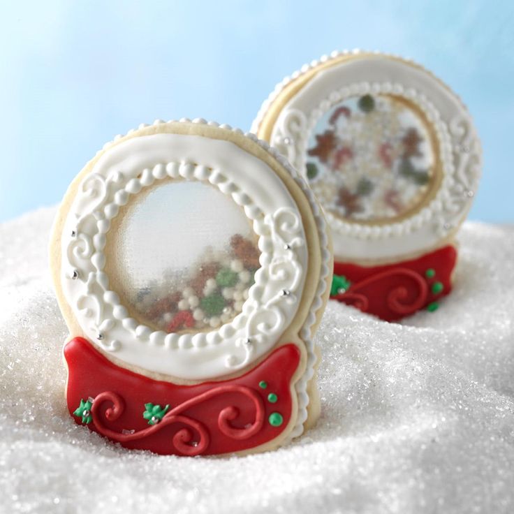 Whimsical Festive Snow Globe Cookies Adorned with Colorful Icing and Sprinkles.