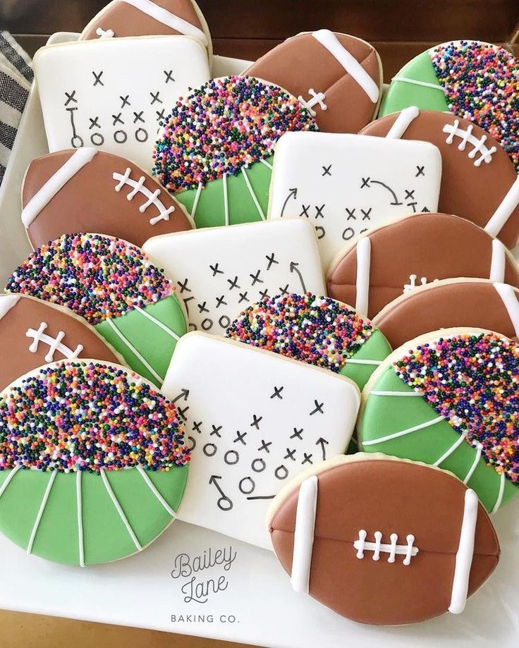 Festive Football-Themed Cookies: Colorful Designs with Icing and Sprinkles for Sports Celebrations.