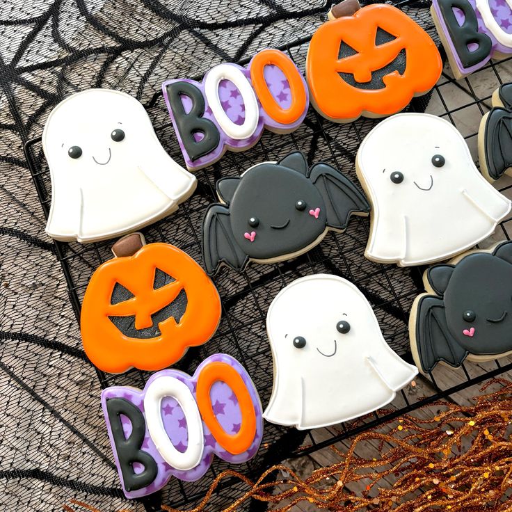 Whimsical Halloween Cookies with Cute Ghost and Pumpkin Designs