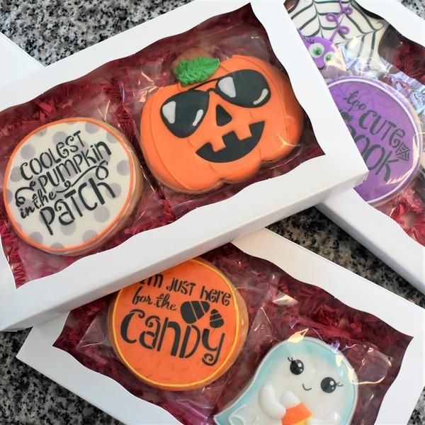 Festive Autumn Cookie Designs with Colorful Illustrations and Whimsical Sayings for Halloween.