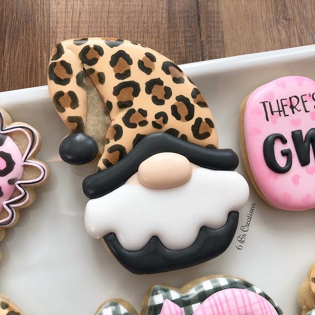 Whimsical Colorful Cookies: Playful Designs with Leopard Print and Pastel Motifs.