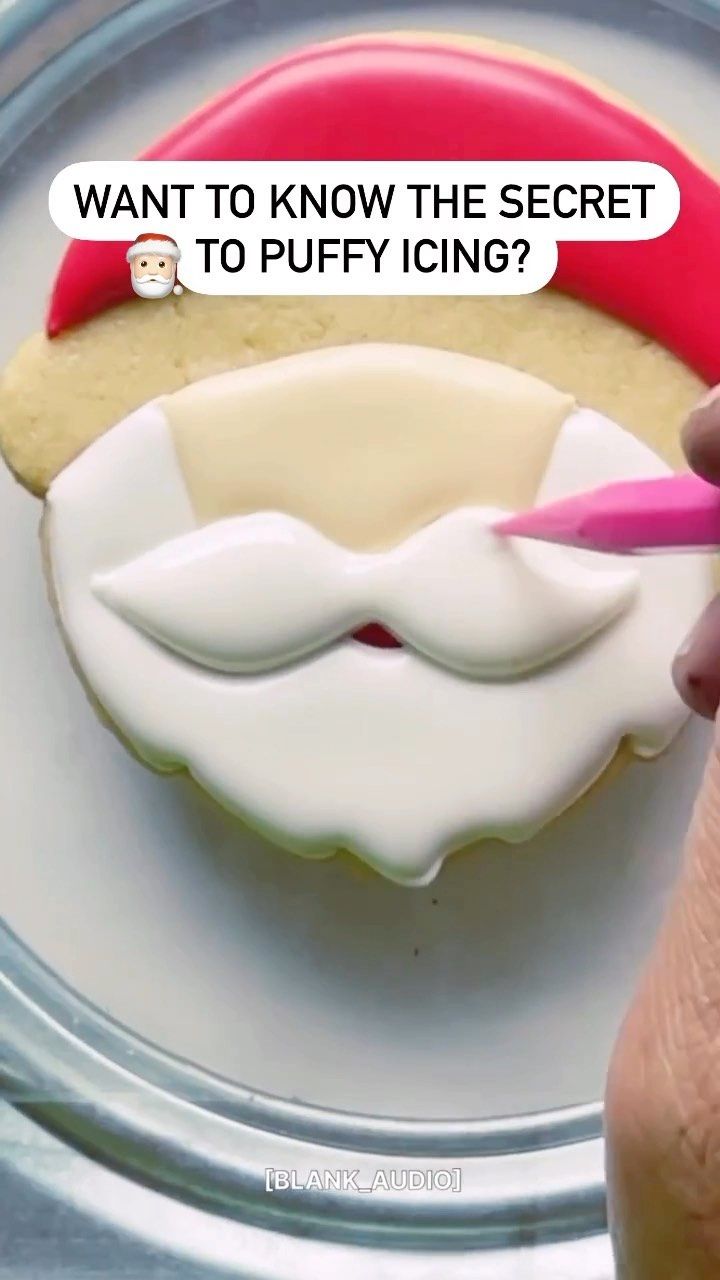 Festively Decorated Santa Cookie with Puffy Icing and Vibrant Colors.