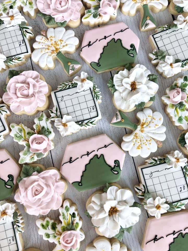 Whimsical Floral-Themed Cookies: A Romantic Celebration of Delicate Designs and Pastel Hues.