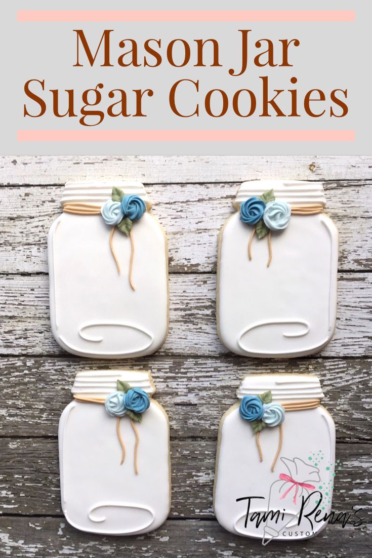 Charming Mason Jar-Inspired Decorative Sugar Cookies with Floral Accents.