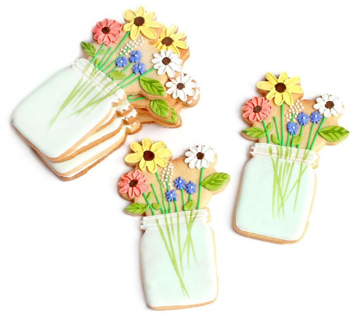 Whimsical Floral Cookie Designs in Pastel Colors for Spring Celebrations.