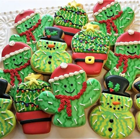 Cheerful Festive Cookie Designs: Playful Cactus and Snowman Shapes with Whimsical Decorations.