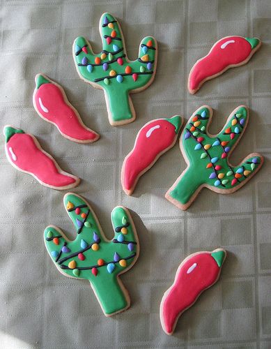 Whimsical Colorful Cacti-Shaped Cookies: A Festive and Eye-Catching Dessert Display.