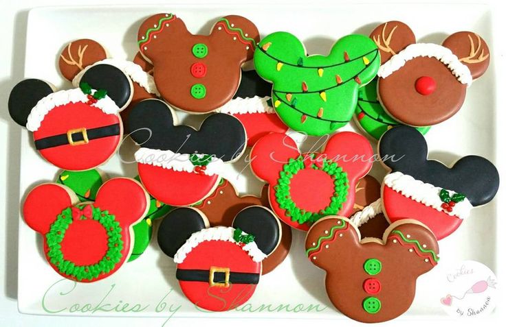 Festive Mouse-Shaped Cookies: Vibrant Holiday Treats Adorned with Intricate Icing Designs.