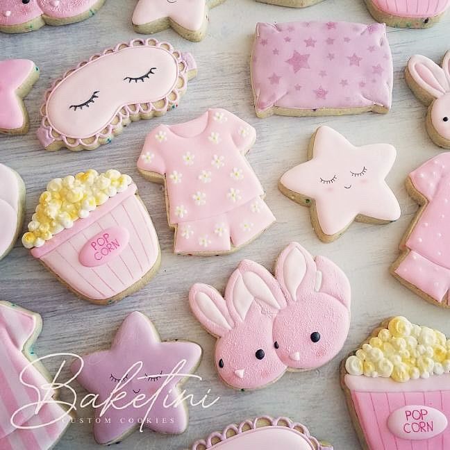 Delightful Pastel Cookie Collection with Whimsical Designs for Celebrations.