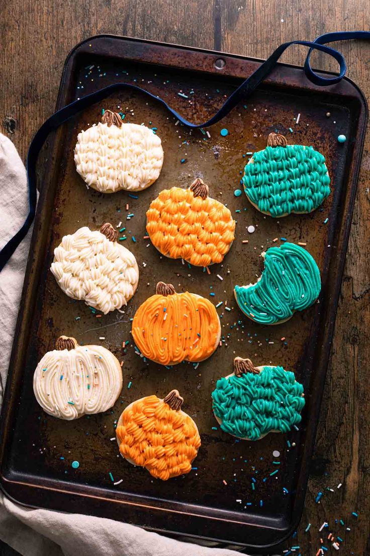 Festive Pumpkin-Shaped Cookies: Colorful Frosting and Sprinkles for Autumn Celebrations