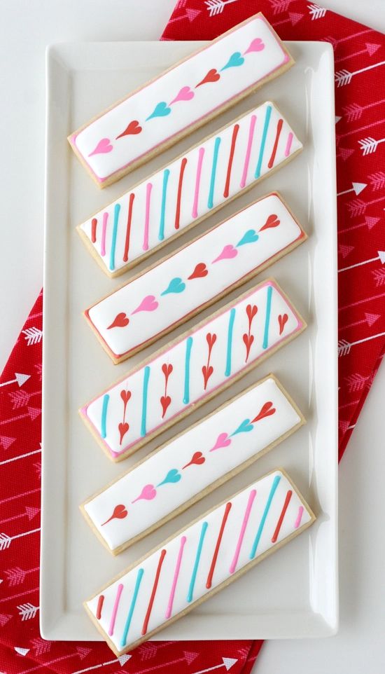 Heart-themed Cookies: Glossy Icing with Playful Pastel Patterns for Romantic Occasions.