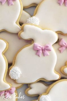 Charming Bunny-Shaped Cookies with Icing and Pink Bows for Festive Occasions.