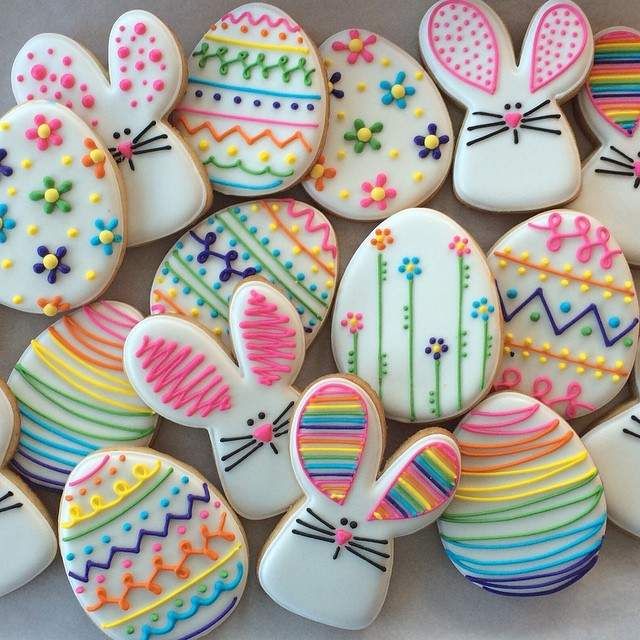 Whimsical Colorful Easter Cookies with Playful Bunny Shapes and Bright Floral Designs