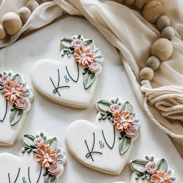 Elegant Heart-Shaped Cookies with Floral Designs for Special Occasions