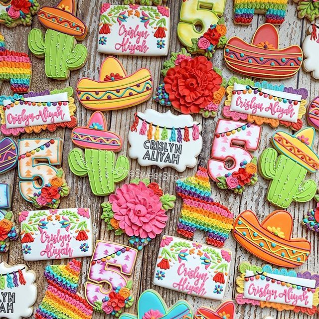 Festive Colorful Sugar Cookies with Intricate Cactus and Floral Designs.