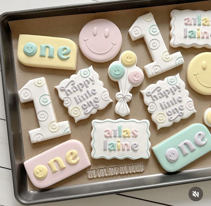 Vibrant Cookie Designs: Cheerful Smiley Faces and Playful Pastels for Festive Celebrations.