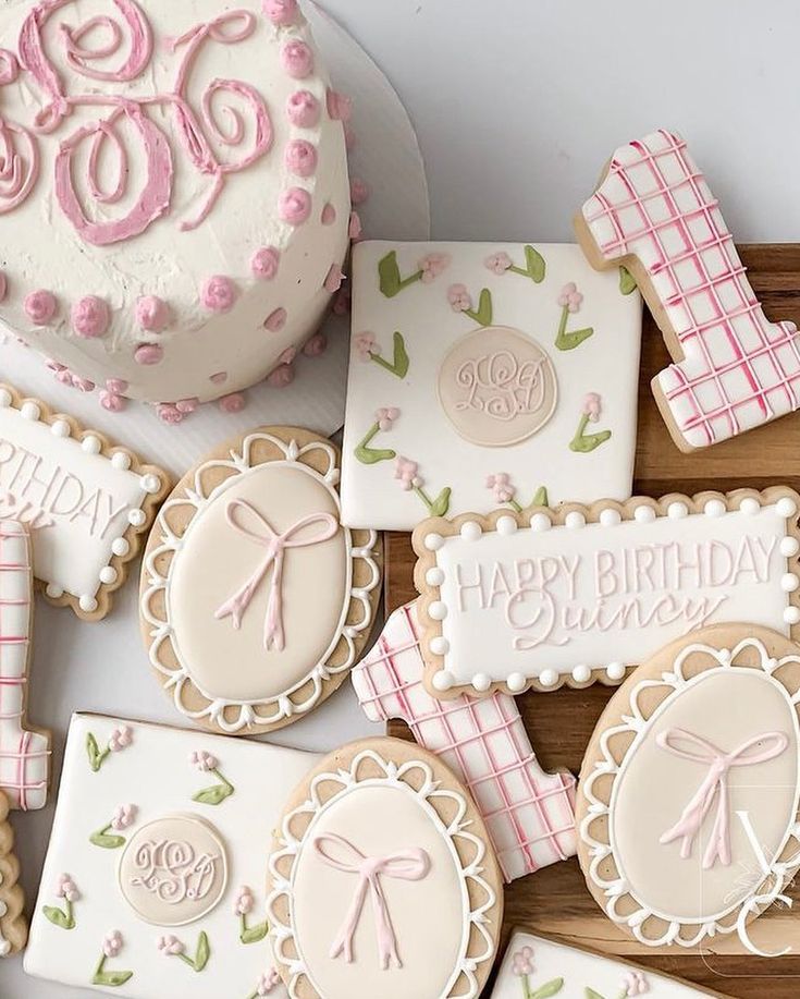 Elegant Pastel Cake and Cookie Assortment for Celebratory Occasions.