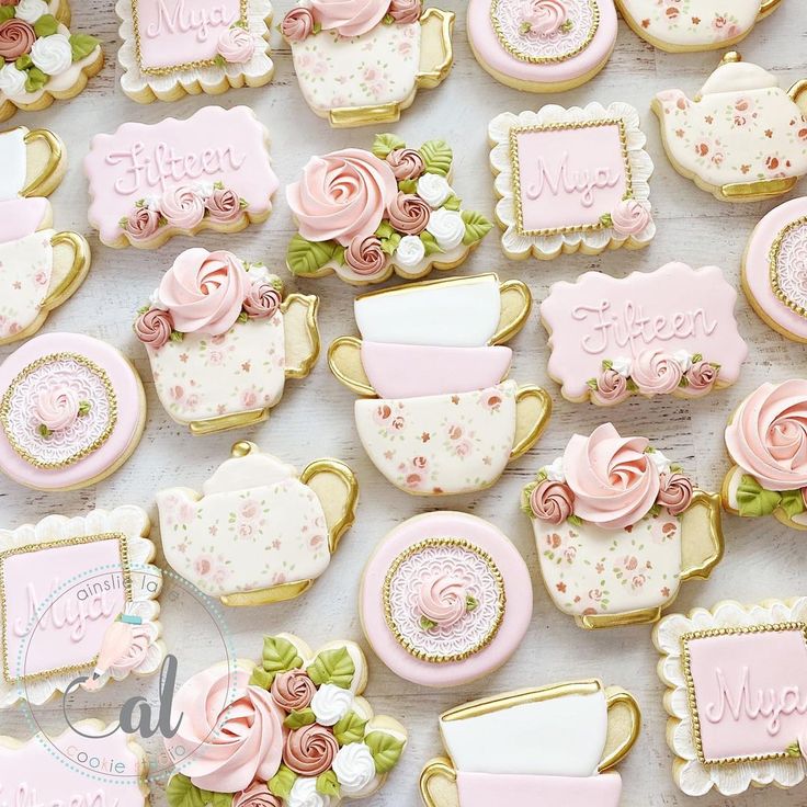 Charming Whimsical Tea Party Featuring Delicate Pastel Cookies and Floral Accents.