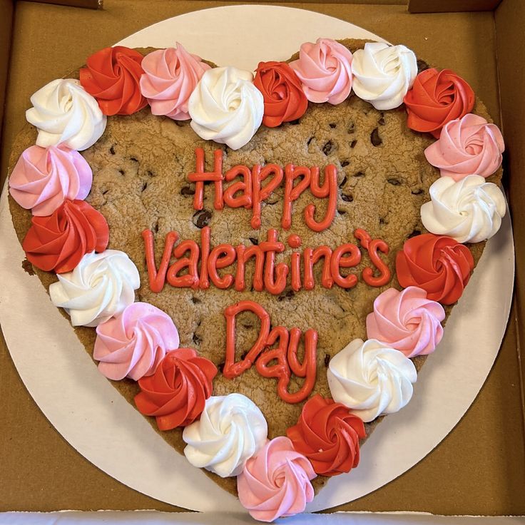 Festive Valentine's Day Heart-Shaped Cookie Cake with Colorful Frosting Swirls