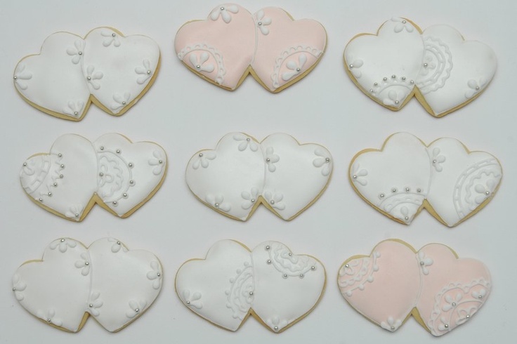 Charming Heart-Shaped Cookies: Elegant Designs for Celebrations and Nail Art Inspiration.