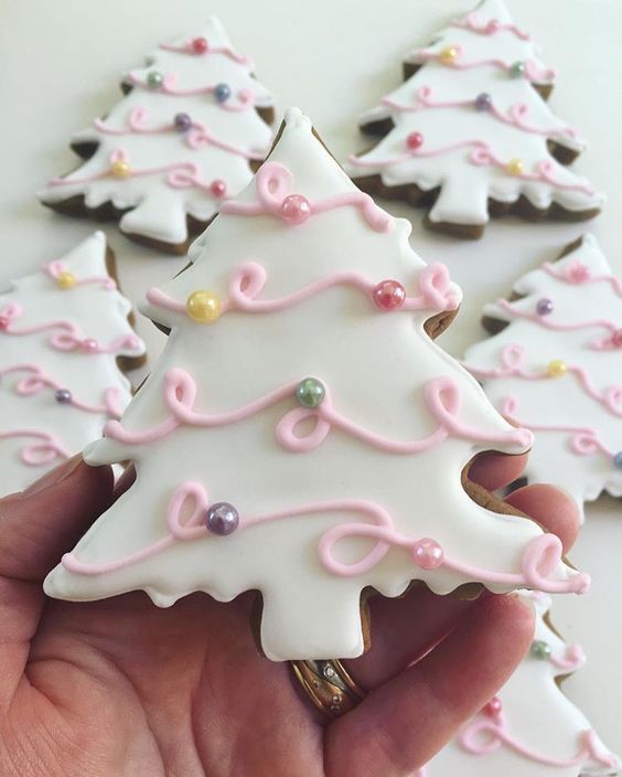 Whimsical Christmas Tree Cookies with Icing and Colorful Decorations