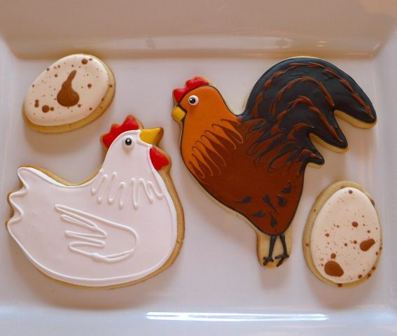 Festive Decorative Cookies: Intricate Chicken and Egg Designs with Elaborate Icing