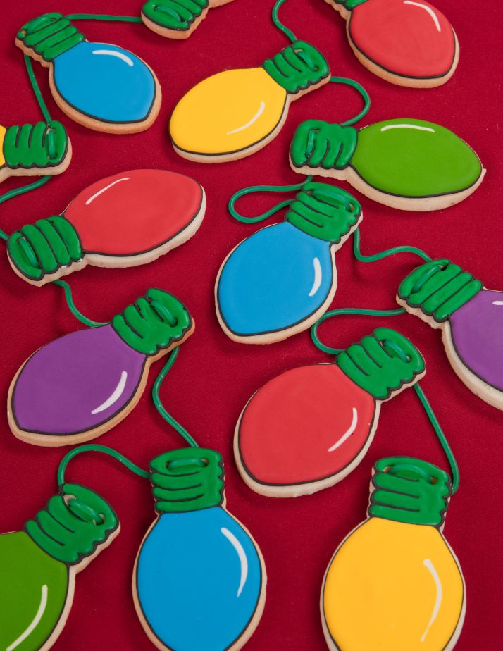 Festive Holiday-Inspired Colorful Cookie Designs Featuring Vibrant Light Bulb Motifs.