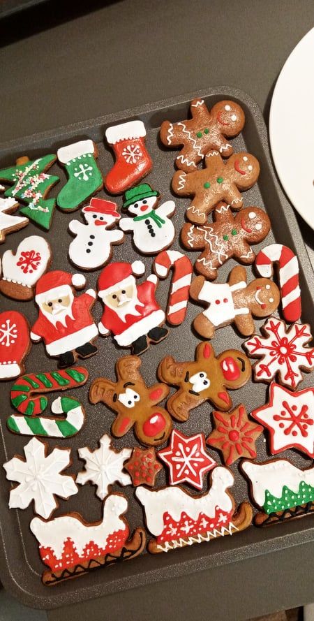 Festive Gingerbread Cookies Enhance Holiday Cheer with Colorful Designs.