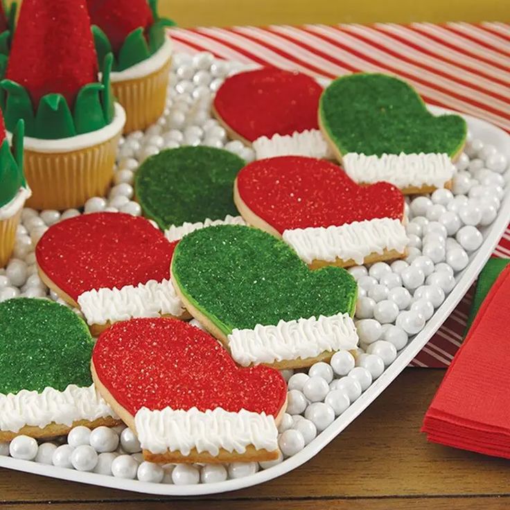 Cheerful Red and Green Festive Mittens Cookies: A Sparkling Centerpiece for Holiday Celebrations.