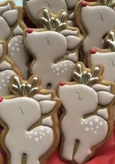 Charming Festive Reindeer-Shaped Cookies with Whimsical Designs and Bright Red Noses.