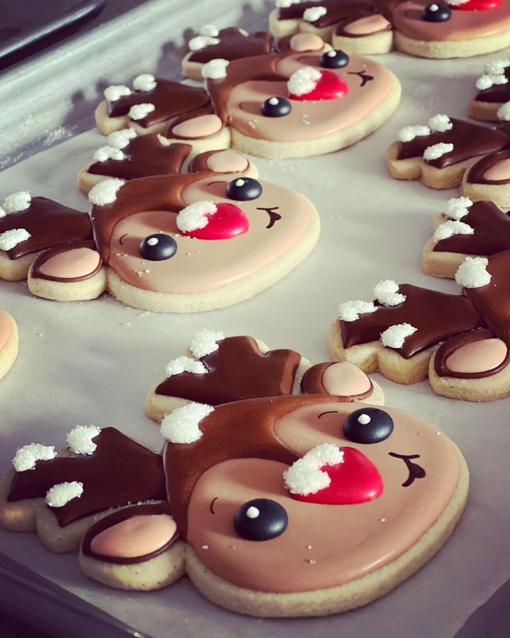 Whimsical Holiday Reindeer Cookies with Colorful Designs and Charming Details.