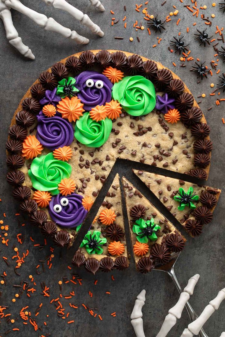 Festive Halloween Cookie Cake with Colorful Frosting and Spooky Decorations