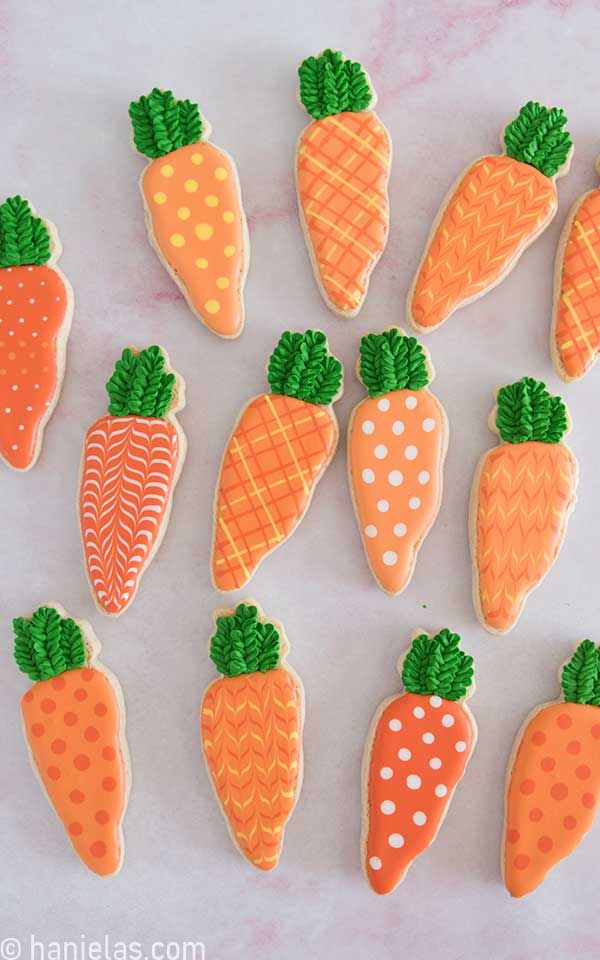 Vibrant Carrot-Themed Nail Designs: Playful Patterns for Festive Spring Celebrations.