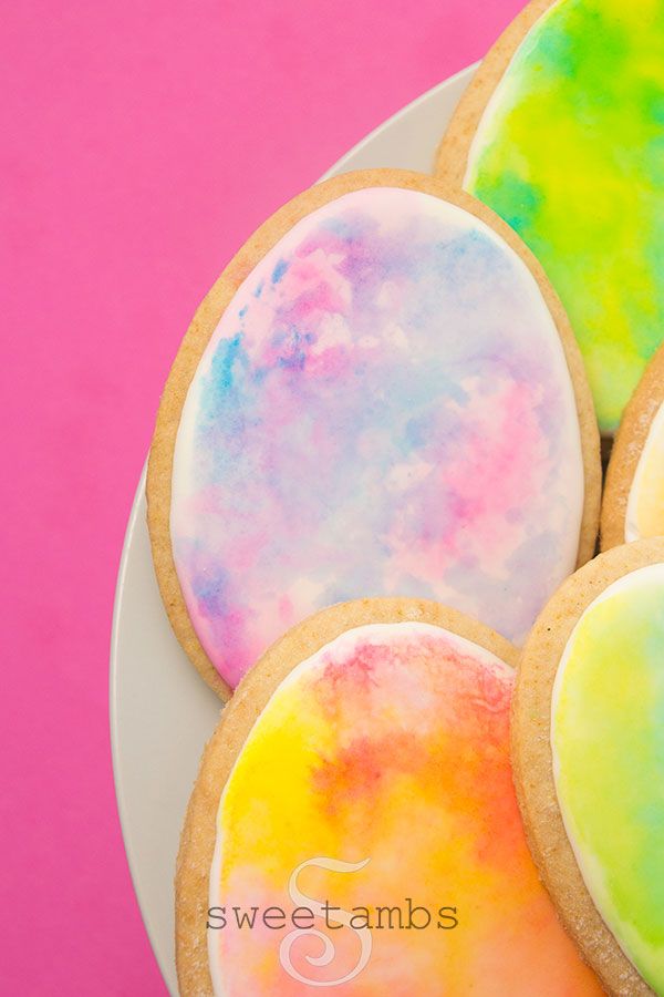 Colorful Watercolor Cookies: Whimsical Pastel Confections for Celebrations.