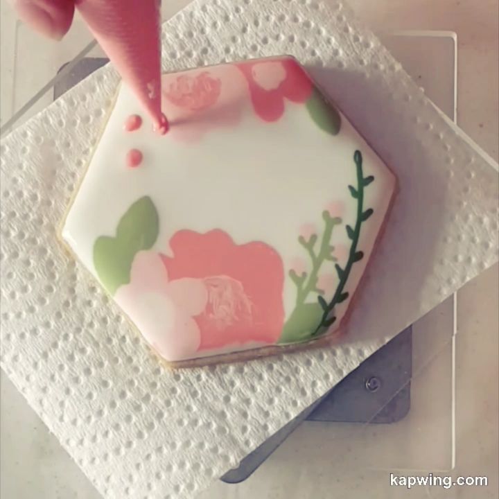 Elegant Floral Hexagonal Cookie with Intricate Piping in Soft Pastel Colors