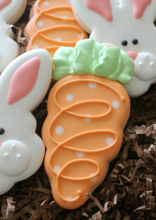 Charming Bunny-Shaped Cookies with Playful Carrot and Whimsical Icing Designs