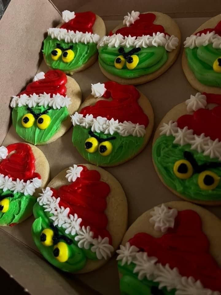 Whimsical Holiday Character Cookies with Vibrant Frosting and Cheerful Details.