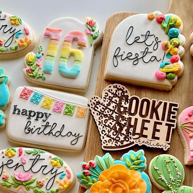 Vibrant Decorative Cookies with Intricate Icing Designs for Celebrations