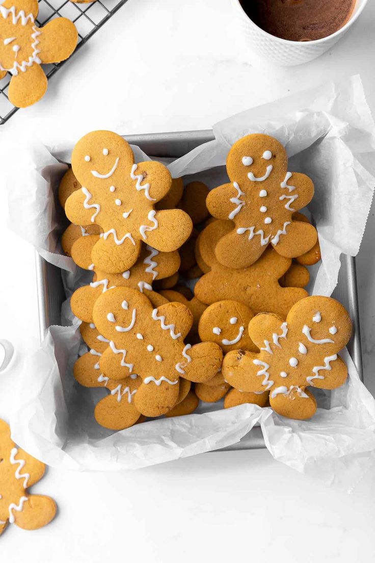 Festive Gingerbread Cookies: Whimsically Shaped and Iced for Cheerful Celebrations.